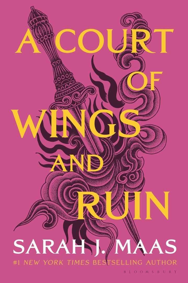 Paperback cover of A Court of Wings and Ruin by Sarah J. Maas (A Court of Thorns and Roses, 3 of 5) features a sword with swirling smoke designs; the title is in bold yellow, author's name in white and yellow below.