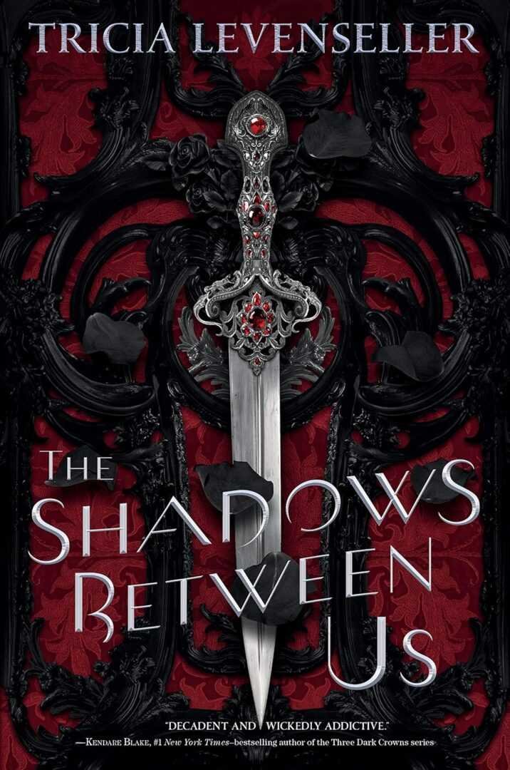 Bestselling paperback of The Shadows Between Us by Tricia Levenseller (The Stathos Sisters, 1 of 2), featuring an ornate silver dagger with red jewels on a detailed black and red background. Title and author are prominently displayed.