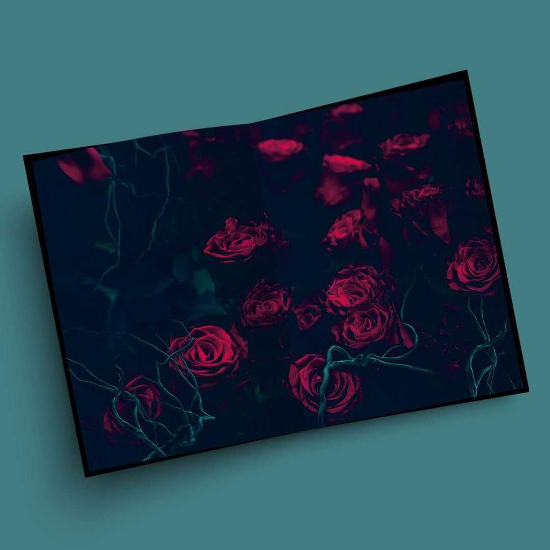 The Coven (Deluxe Edition) by Harper L. Woods features a dark, moody spread of red roses and twisted vines on teal—perfect for romance fans. Book 1 of the Coven of Bones series (paperback).