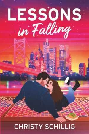 A couple lounges on a hammock at sunset, city skyline behind them, about to kiss. Nearby rests a sandwich. The book cover reads Lessons in Falling [Signed] by Christy Schillig (Out of Office, 1 of 1), ideal for romance fans.