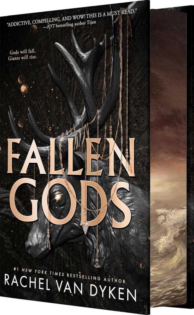 The deluxe limited edition of Fallen Gods by Rachel Van Dyken, a BookTok favorite, features a dark mystical stag with large antlers, golden chains, and a stormy background, plus bold metallic lettering for the title and author's name.