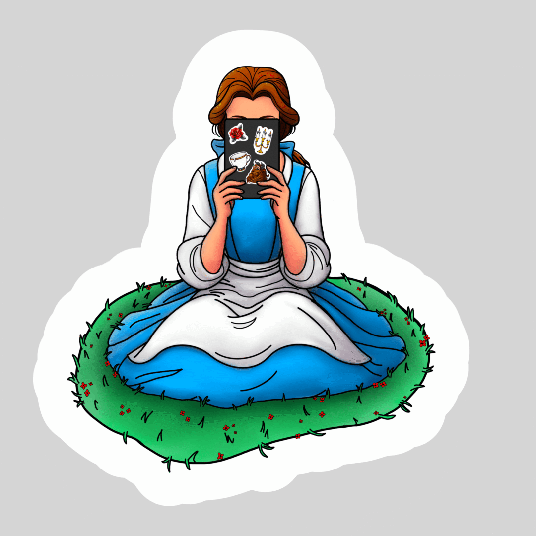 A woman in a blue and white dress sits cross-legged on grass, holding an open "Belle Beauty and Beast Kindle Reading – 3" Waterproof Bookish Sticker with Holo Overlay" in front of her face. The background is light gray with a white border.