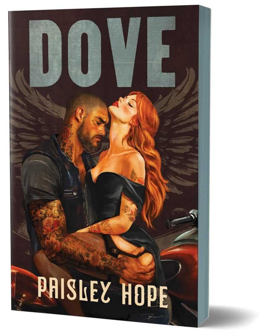 The paperback "Dove (Deluxe Edition) (The Soldiers of Bedlam)" by Paisley Hope features cover art of a tattooed man holding a red haired woman in black, with wing motifs and a motorcycle nodding to the series.