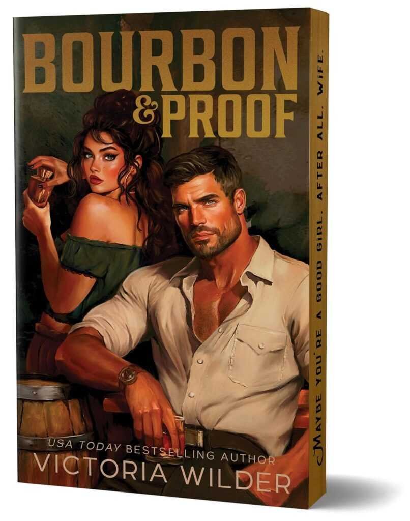3D book cover for Bourbon & Proof (Deluxe Edition) (Bourbon Boys) by Victoria Wilder (Paperback): A rugged man at a bar with bourbon, a glamorous woman behind him. Tagline: Maybe you’re a good girl after all. Wife.