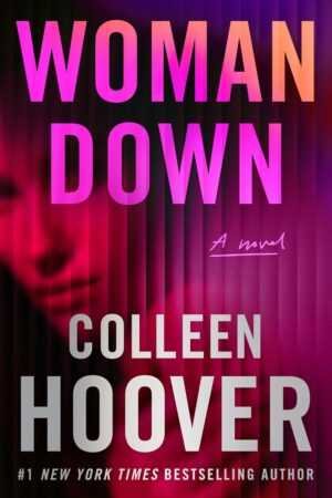 The paperback cover of "Woman Down" by Colleen Hoover features bold pink and white title text over an abstract, blurred woman's face, with the subtitle "A novel." #1 New York Times bestselling author.