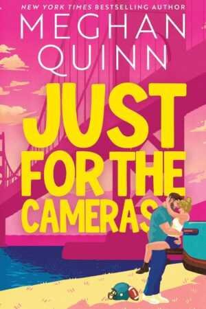 Illustrated book cover for Just for the Cameras (Deluxe Edition) by Meghan Quinn (Bay Area Players, 1 of 2): a couple kisses beside a car, with a football helmet on the ground and a large bridge in the bright background.