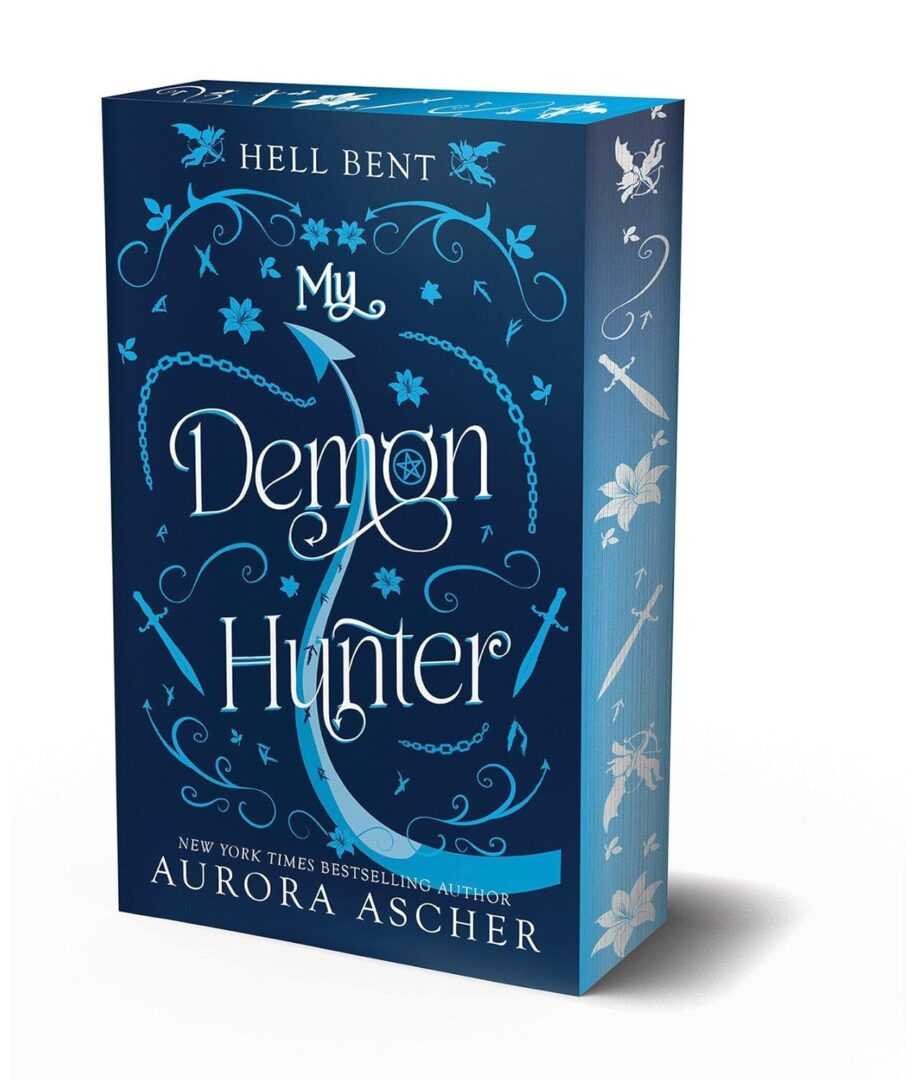 The Deluxe Limited Edition paperback of My Demon Hunter: Hell Bent by Aurora Ascher features a blue cover with ornate white designs, swords, and vines, the title at the top, and the author’s name at the bottom.